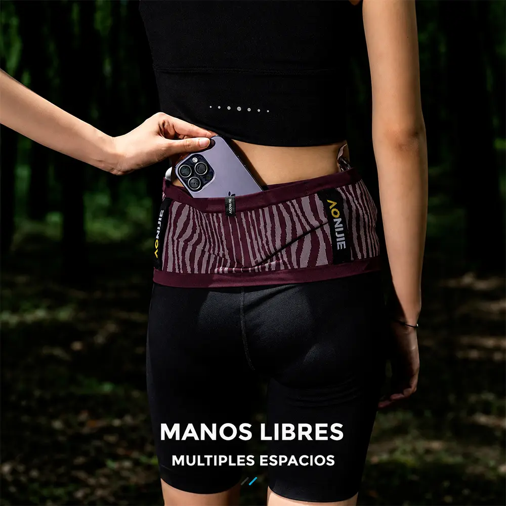 Cinturon_Running_Trail_Running_AONIJIE_red_wine_01 Cinturón AONIJIE Stripe con compartimento tubular de cuatro accesos para organizar accesorios de running.